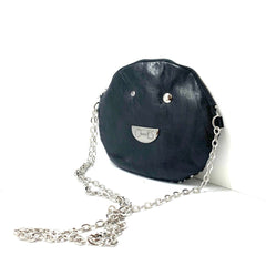 Muse wonky eye chain black-white cow handbag