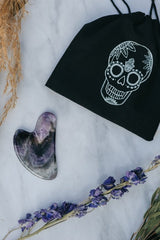 Amethyst Crystal Gua Sha with Black Skull Pouch - Cosmetic Tools - British D'sire