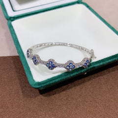 Elegant 5 Motif Blue Sapphire and CZ Bangle in Sterling Silver - Heated Sapphires - Perfect Jewelry for Women - 20 Blue Sapphires (3 mm) - Dimensions: 5.8 cm - Bracelets & Bangles - British D'sire