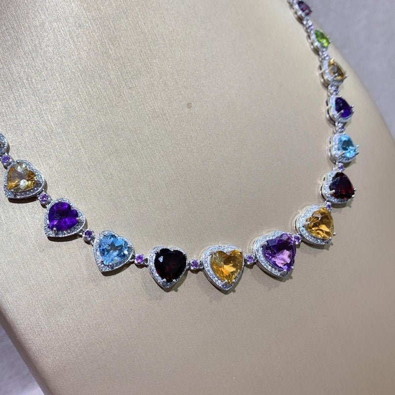 Natural Heart Shaped Tennis Necklace with Semi - Precious Gemstones & CZ - Elegant Jewelry for Women - Amethyst, Citrine, Red Garnet, Blue Topaz, Olivine, White and Purple CZ in Prong and Halo Setting on 925 Silver (33 Stones, 53 ct) with multi dimensions - Necklace - British D'sire