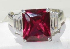 Jewellery Kingdom Emerald Cut Sterling Silver 8CT Three Stone Ladies Ruby Ring (Red) - Jewelry Rings - British D'sire